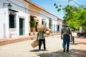 Mompox, two friends walking down the street